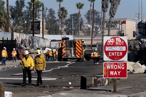 Arson appears to be the likely cause of fire on part of vital Los Angeles freeway, California governor says